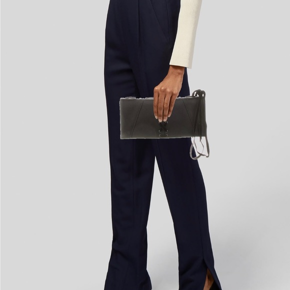 Pre-loved Yves Saint Laurent satin clutch in black - Picture 4 of 4